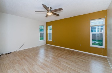 AFFORDABLE HOME IN THE HEART OF SPRING HILL ~ Welcome to this on Oak Hills Country Club in Florida - for sale on GolfHomes.com, golf home, golf lot