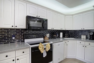 Meticulously remodeled, fully furnished, one bedroom, one bath on Ocean Village Golf Course in Florida - for sale on GolfHomes.com, golf home, golf lot