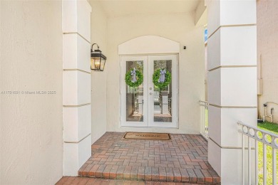 Exquisite 4BR/4BA pool home nestled on a private cul-de-sac in on Weston Hills Country Club in Florida - for sale on GolfHomes.com, golf home, golf lot