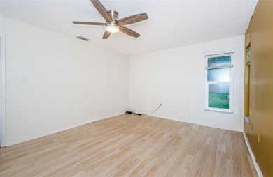 AFFORDABLE HOME IN THE HEART OF SPRING HILL ~ Welcome to this on Oak Hills Country Club in Florida - for sale on GolfHomes.com, golf home, golf lot