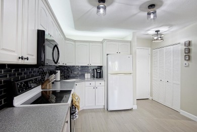 Meticulously remodeled, fully furnished, one bedroom, one bath on Ocean Village Golf Course in Florida - for sale on GolfHomes.com, golf home, golf lot