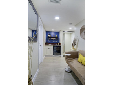 Meticulously remodeled, fully furnished, one bedroom, one bath on Ocean Village Golf Course in Florida - for sale on GolfHomes.com, golf home, golf lot