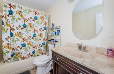 AFFORDABLE HOME IN THE HEART OF SPRING HILL ~ Welcome to this on Oak Hills Country Club in Florida - for sale on GolfHomes.com, golf home, golf lot