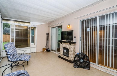 AFFORDABLE HOME IN THE HEART OF SPRING HILL ~ Welcome to this on Oak Hills Country Club in Florida - for sale on GolfHomes.com, golf home, golf lot