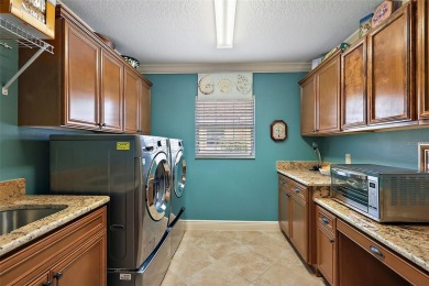 EXCEPTIONAL 4/2 Ivy with EXPANSIVE UNDER-AIR ENCLOSED LANAI on Pennbrooke Fairways in Florida - for sale on GolfHomes.com, golf home, golf lot