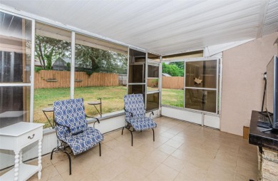 AFFORDABLE HOME IN THE HEART OF SPRING HILL ~ Welcome to this on Oak Hills Country Club in Florida - for sale on GolfHomes.com, golf home, golf lot