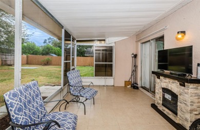 AFFORDABLE HOME IN THE HEART OF SPRING HILL ~ Welcome to this on Oak Hills Country Club in Florida - for sale on GolfHomes.com, golf home, golf lot