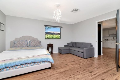 Discover the perfect multigenerational living opportunity in on Plantation Palms Golf Club in Florida - for sale on GolfHomes.com, golf home, golf lot