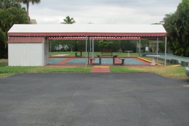 You don't want to miss this amazing unit in a very sought after on Poinciana Golf Club in Florida - for sale on GolfHomes.com, golf home, golf lot