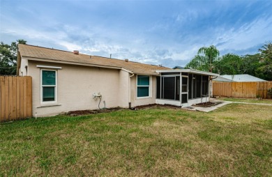 AFFORDABLE HOME IN THE HEART OF SPRING HILL ~ Welcome to this on Oak Hills Country Club in Florida - for sale on GolfHomes.com, golf home, golf lot