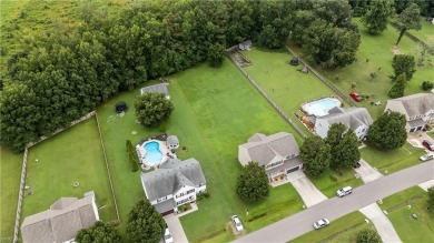 Nestled in the Eagle Creek Golf community this beautiful and on Eagle Creek Golf Club and Grill in North Carolina - for sale on GolfHomes.com, golf home, golf lot