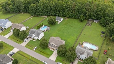 Nestled in the Eagle Creek Golf community this beautiful and on Eagle Creek Golf Club and Grill in North Carolina - for sale on GolfHomes.com, golf home, golf lot