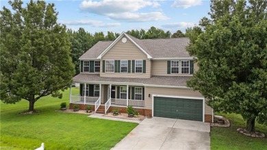 Nestled in the Eagle Creek Golf community this beautiful and on Eagle Creek Golf Club and Grill in North Carolina - for sale on GolfHomes.com, golf home, golf lot