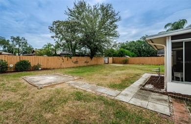 AFFORDABLE HOME IN THE HEART OF SPRING HILL ~ Welcome to this on Oak Hills Country Club in Florida - for sale on GolfHomes.com, golf home, golf lot