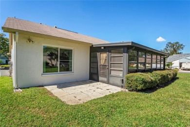 One or more photo(s) has been virtually staged. **Charming on Summertree Golf Course in Florida - for sale on GolfHomes.com, golf home, golf lot