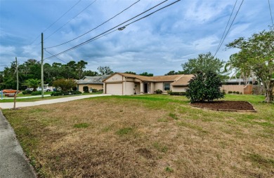 AFFORDABLE HOME IN THE HEART OF SPRING HILL ~ Welcome to this on Oak Hills Country Club in Florida - for sale on GolfHomes.com, golf home, golf lot