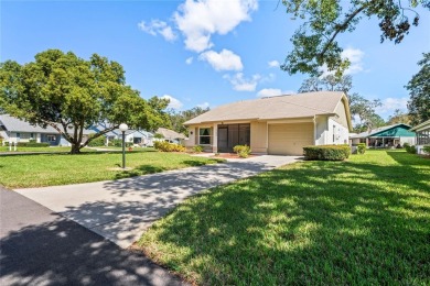 One or more photo(s) has been virtually staged. **Charming on Summertree Golf Course in Florida - for sale on GolfHomes.com, golf home, golf lot