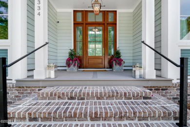 Introducing a stunning 3-bedroom, 3.5-bath estate that captures on Berkeley Hall Golf Club in South Carolina - for sale on GolfHomes.com, golf home, golf lot