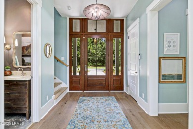Introducing a stunning 3-bedroom, 3.5-bath estate that captures on Berkeley Hall Golf Club in South Carolina - for sale on GolfHomes.com, golf home, golf lot