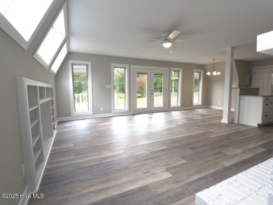 Welcome to 211 Country Club Road--a one-of-a-kind A-frame on Rock Creek Country Club in North Carolina - for sale on GolfHomes.com, golf home, golf lot