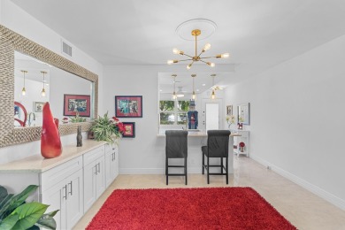This exquisite 2BD/2BA 1st floor condo has been meticulously on Wynmoor Golf Course in Florida - for sale on GolfHomes.com, golf home, golf lot
