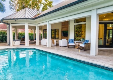Introducing a luxurious retreat nestled within the prestigious on Club at Pelican Bay Golf Course in Florida - for sale on GolfHomes.com, golf home, golf lot