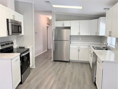 Experience a dramatic reduction in price and seize your slice of on Blue Heron Pines Golf Course in Florida - for sale on GolfHomes.com, golf home, golf lot