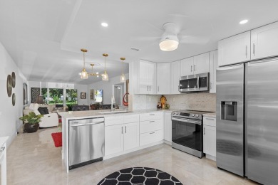 This exquisite 2BD/2BA 1st floor condo has been meticulously on Wynmoor Golf Course in Florida - for sale on GolfHomes.com, golf home, golf lot