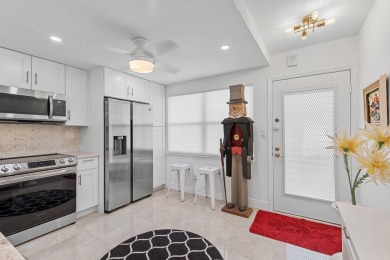 This exquisite 2BD/2BA 1st floor condo has been meticulously on Wynmoor Golf Course in Florida - for sale on GolfHomes.com, golf home, golf lot