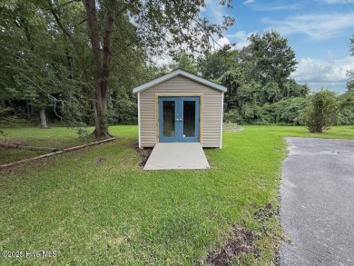 Welcome to 211 Country Club Road--a one-of-a-kind A-frame on Rock Creek Country Club in North Carolina - for sale on GolfHomes.com, golf home, golf lot