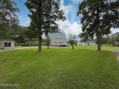 Welcome to 211 Country Club Road--a one-of-a-kind A-frame on Rock Creek Country Club in North Carolina - for sale on GolfHomes.com, golf home, golf lot