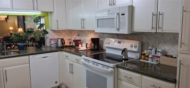 BEAUTIFUL LARGE 2 bed /2 full baths ground floor corner unit in on Sunrise Lakes Phase IV Golf Course in Florida - for sale on GolfHomes.com, golf home, golf lot