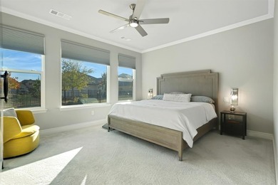 This stunning, light-filled home showcases an open-concept on Wildhorse Golf Club of Robson Ranch in Texas - for sale on GolfHomes.com, golf home, golf lot