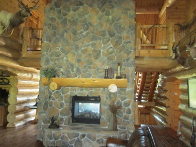 Is Golf your Game? This stunning full log home is perfect for on Garland Resort and Golf Club  in Michigan - for sale on GolfHomes.com, golf home, golf lot
