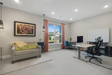 This stunning, light-filled home showcases an open-concept on Wildhorse Golf Club of Robson Ranch in Texas - for sale on GolfHomes.com, golf home, golf lot