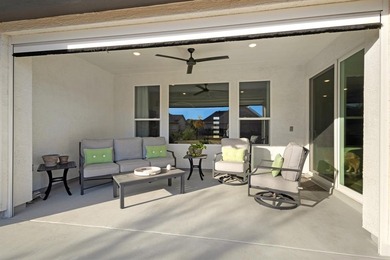 This stunning, light-filled home showcases an open-concept on Wildhorse Golf Club of Robson Ranch in Texas - for sale on GolfHomes.com, golf home, golf lot