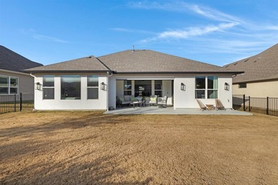 This stunning, light-filled home showcases an open-concept on Wildhorse Golf Club of Robson Ranch in Texas - for sale on GolfHomes.com, golf home, golf lot