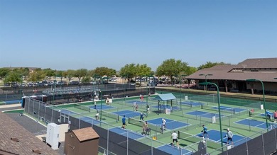 This stunning, light-filled home showcases an open-concept on Wildhorse Golf Club of Robson Ranch in Texas - for sale on GolfHomes.com, golf home, golf lot