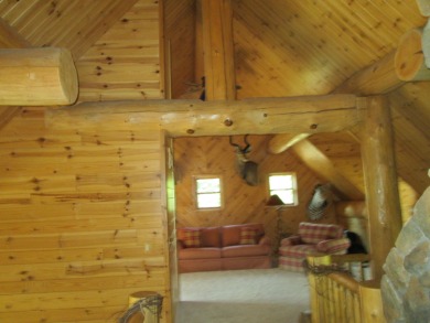 Is Golf your Game? This stunning full log home is perfect for on Garland Resort and Golf Club  in Michigan - for sale on GolfHomes.com, golf home, golf lot