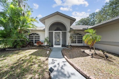 Located on a large corner lot along a peaceful canal, this on Spring Lake Golf Resort in Florida - for sale on GolfHomes.com, golf home, golf lot