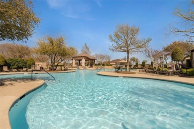 This stunning, light-filled home showcases an open-concept on Wildhorse Golf Club of Robson Ranch in Texas - for sale on GolfHomes.com, golf home, golf lot