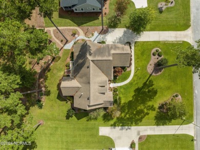 Welcome to your dream home nestled on the picturesque 6th hole on Carolina Colours Golf Club in North Carolina - for sale on GolfHomes.com, golf home, golf lot