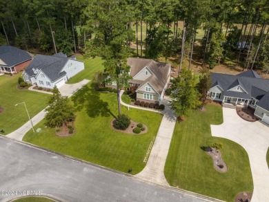 Welcome to your dream home nestled on the picturesque 6th hole on Carolina Colours Golf Club in North Carolina - for sale on GolfHomes.com, golf home, golf lot