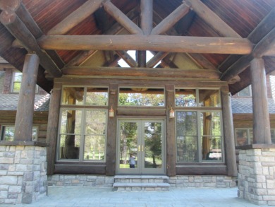 Is Golf your Game? This stunning full log home is perfect for on Garland Resort and Golf Club  in Michigan - for sale on GolfHomes.com, golf home, golf lot