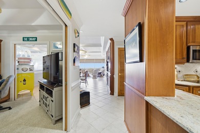 Welcome to Dolphin Point Penthouse 703A, a premier west corner on Sandpiper Cove Golf Course in Florida - for sale on GolfHomes.com, golf home, golf lot