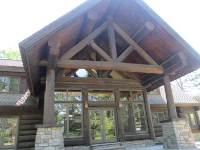 Is Golf your Game? This stunning full log home is perfect for on Garland Resort and Golf Club  in Michigan - for sale on GolfHomes.com, golf home, golf lot