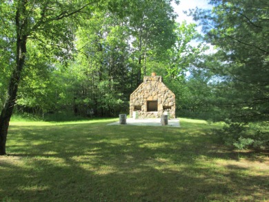 Is Golf your Game? This stunning full log home is perfect for on Garland Resort and Golf Club  in Michigan - for sale on GolfHomes.com, golf home, golf lot