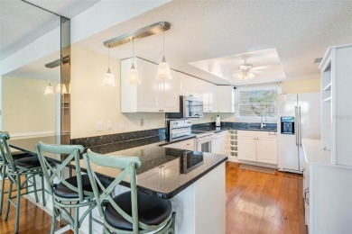 Beautifully Updated 3 bedroom 2  1/2  bath Townhome with on The Dunedin Country Club in Florida - for sale on GolfHomes.com, golf home, golf lot