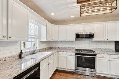 Welcome to 1215 Four Wood Drive, a beautifully updated home on a on Baywood Golf Club in North Carolina - for sale on GolfHomes.com, golf home, golf lot