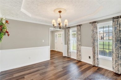 Welcome to 1215 Four Wood Drive, a beautifully updated home on a on Baywood Golf Club in North Carolina - for sale on GolfHomes.com, golf home, golf lot